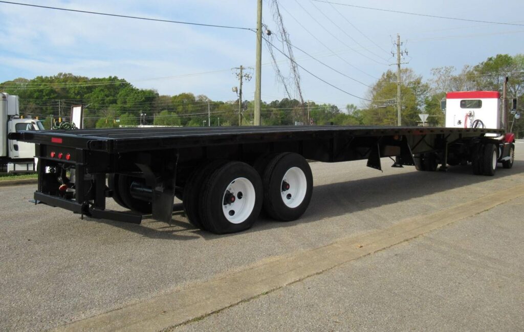 2004 Lufkin 48×102 Combination Flatbed Trailer – Spring, Sliding Axle