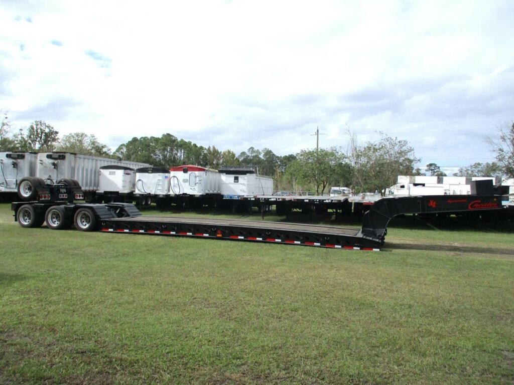 2007 XL Specialized X-L 100 CHDG TRI-AXLE PONYMOTOR WITH 4TH FLIP AXLE