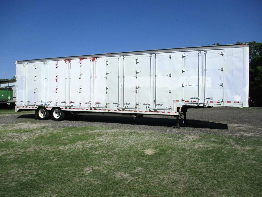 1999 Kentucky 48 DROP FRAME WITH 7 CURBSIDE DOORS