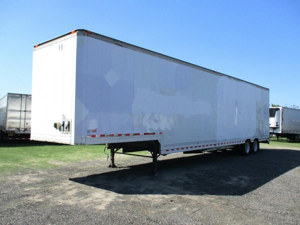 1999 Kentucky 48 DROP FRAME WITH 7 CURBSIDE DOORS