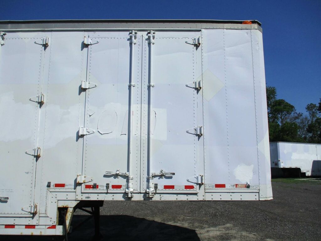 1999 Kentucky 48 DROP FRAME WITH 7 CURBSIDE DOORS