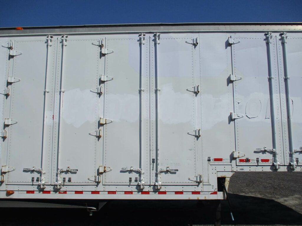 1999 Kentucky 48 DROP FRAME WITH 7 CURBSIDE DOORS