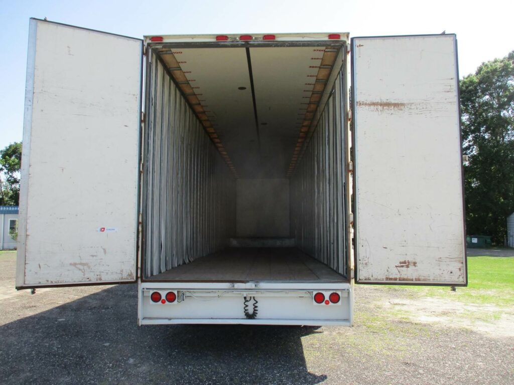 1999 Kentucky 48 DROP FRAME WITH 7 CURBSIDE DOORS