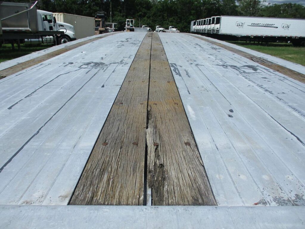 2010 Benson 48X102 ALUMINUM SPREAD AXLE FLAYBED