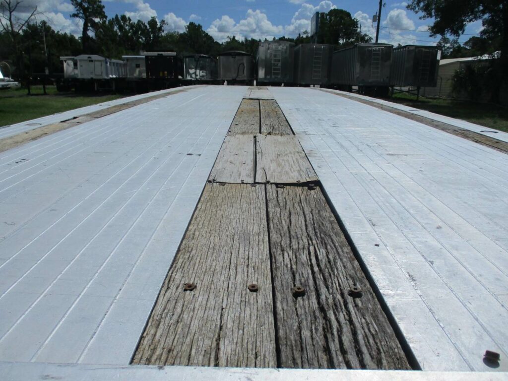 2010 Benson 48X102 ALUMINUM SPREAD AXLE FLAYBED