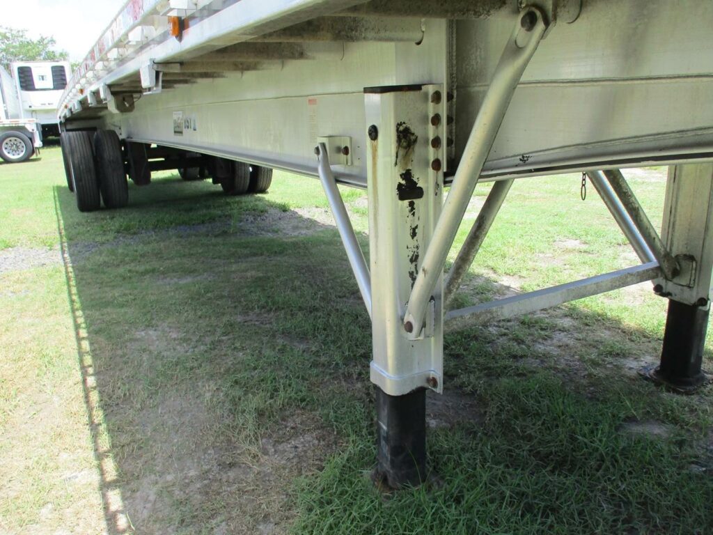 2015 East 48X120 ALUMINUM FLATBED WITH LIFT AXLE